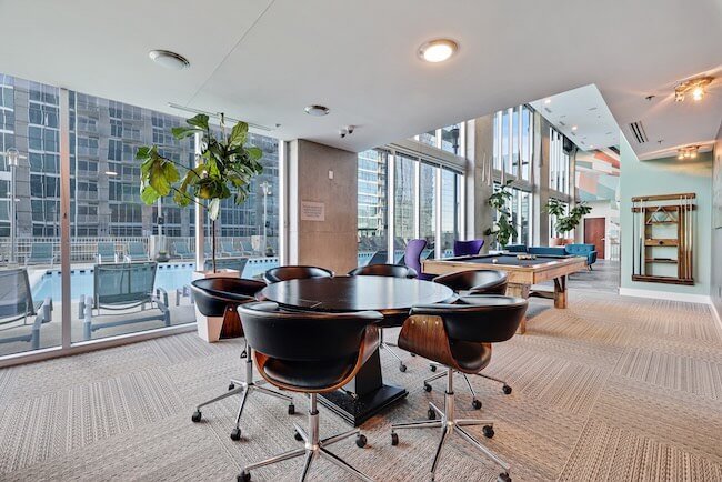 Indoor Conference Table and Recreation Area with Pool Table at The Encore Condos in Downtown Nashville, Tennessee