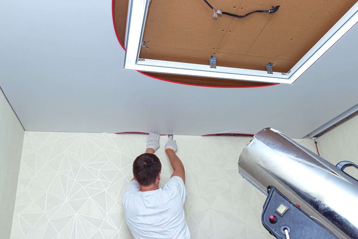 A Stretch Ceiling Being Installed
