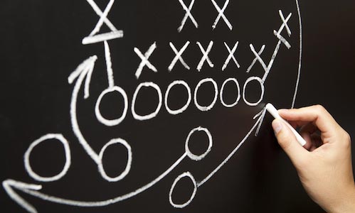 A chalkboard showcasing football strategy